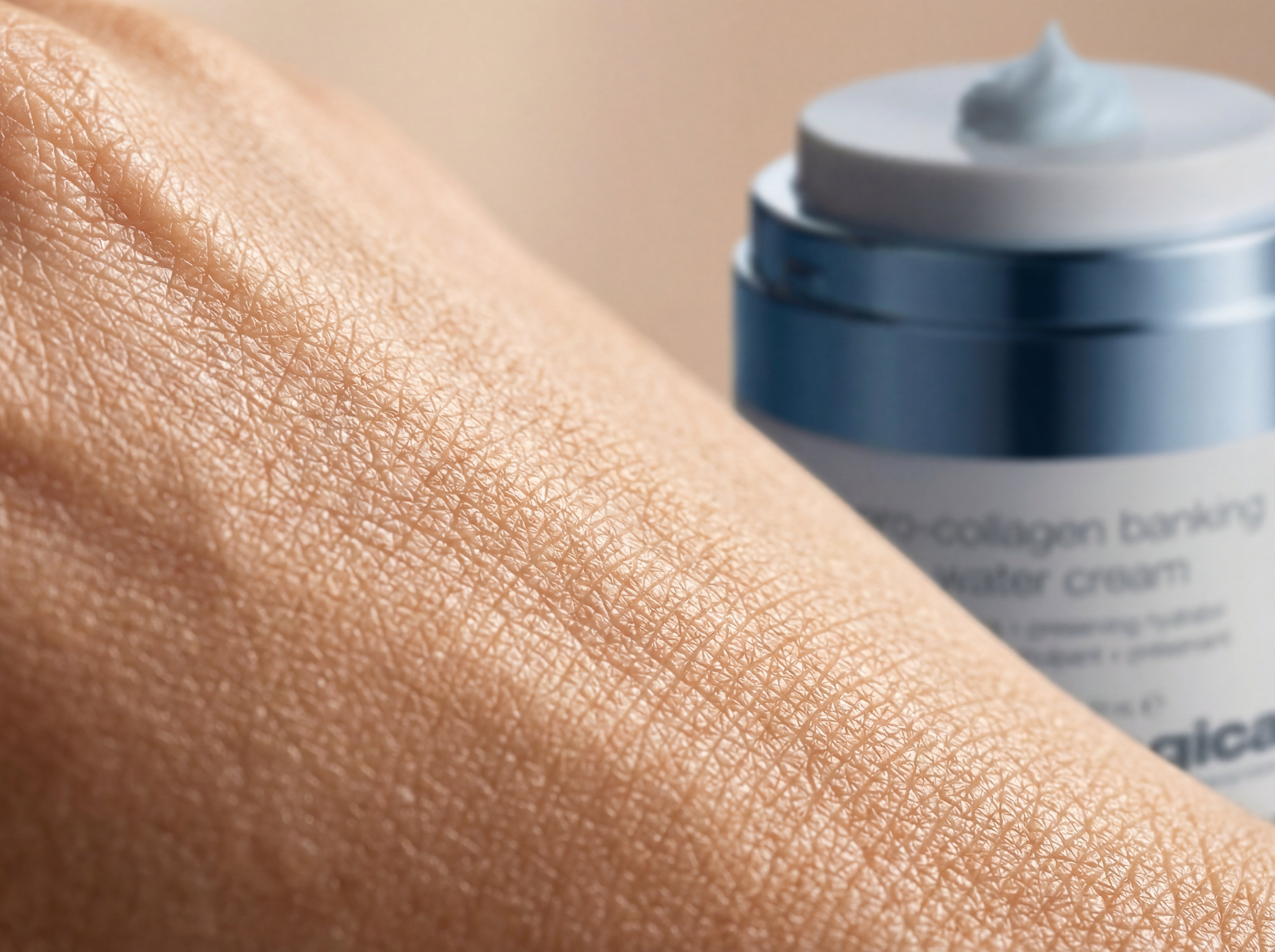 Macro close-up of natural skin texture showing fine lines, pores, and surface detail in soft lighting