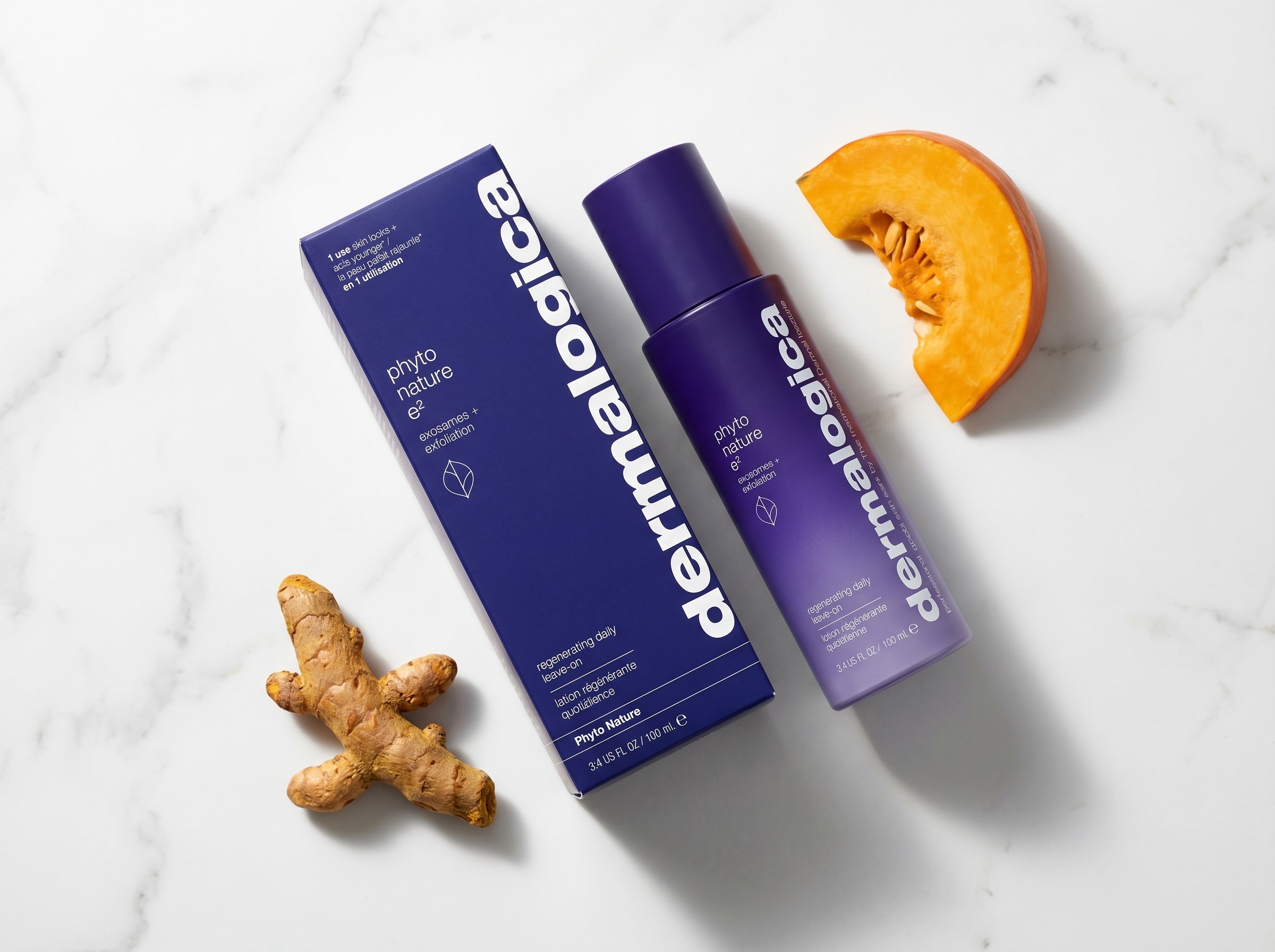 Dermalogica Phyto Nature E2 exosome treatment on white marble beside dried turmeric root and pumpkin, natural light