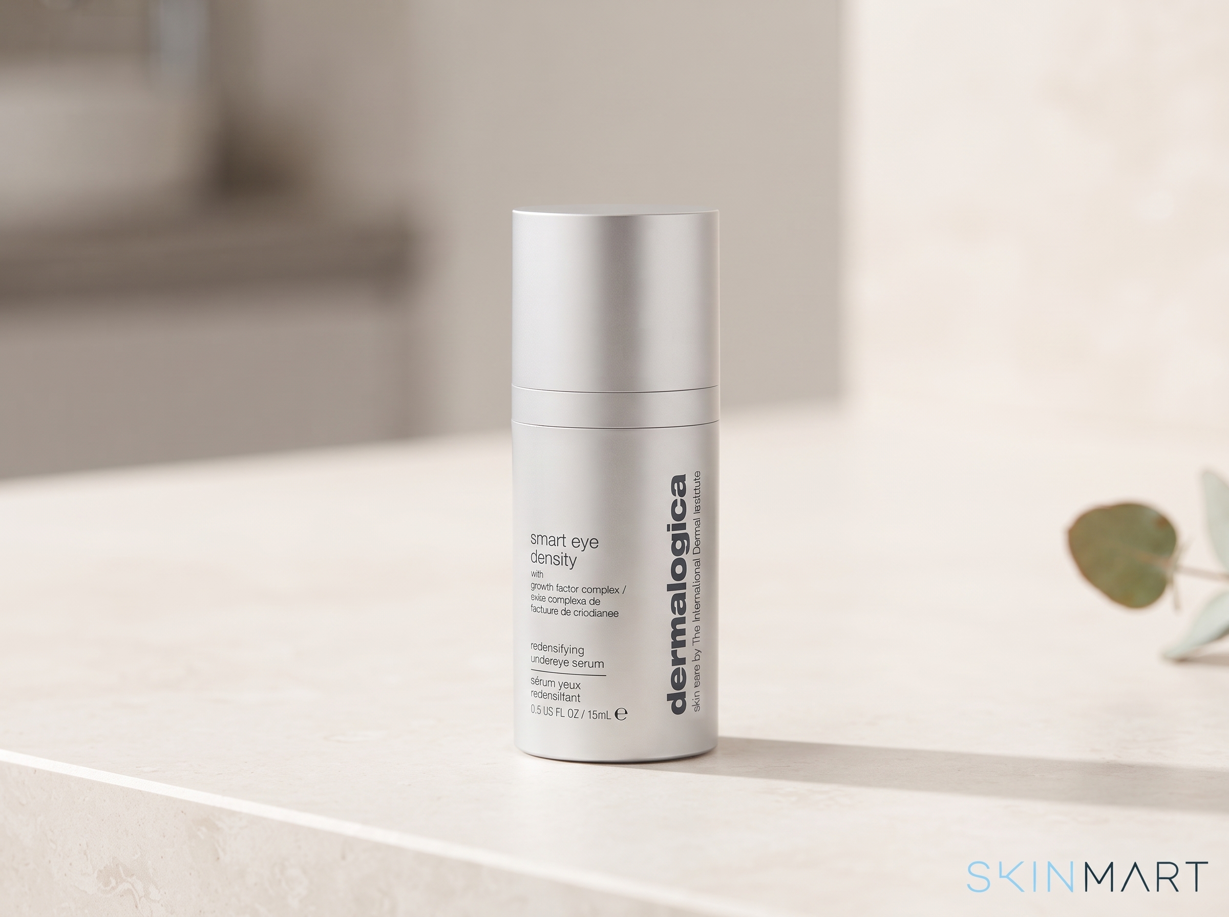 Dermalogica Smart Eye Density Booster bottle on a pale stone surface in soft natural light