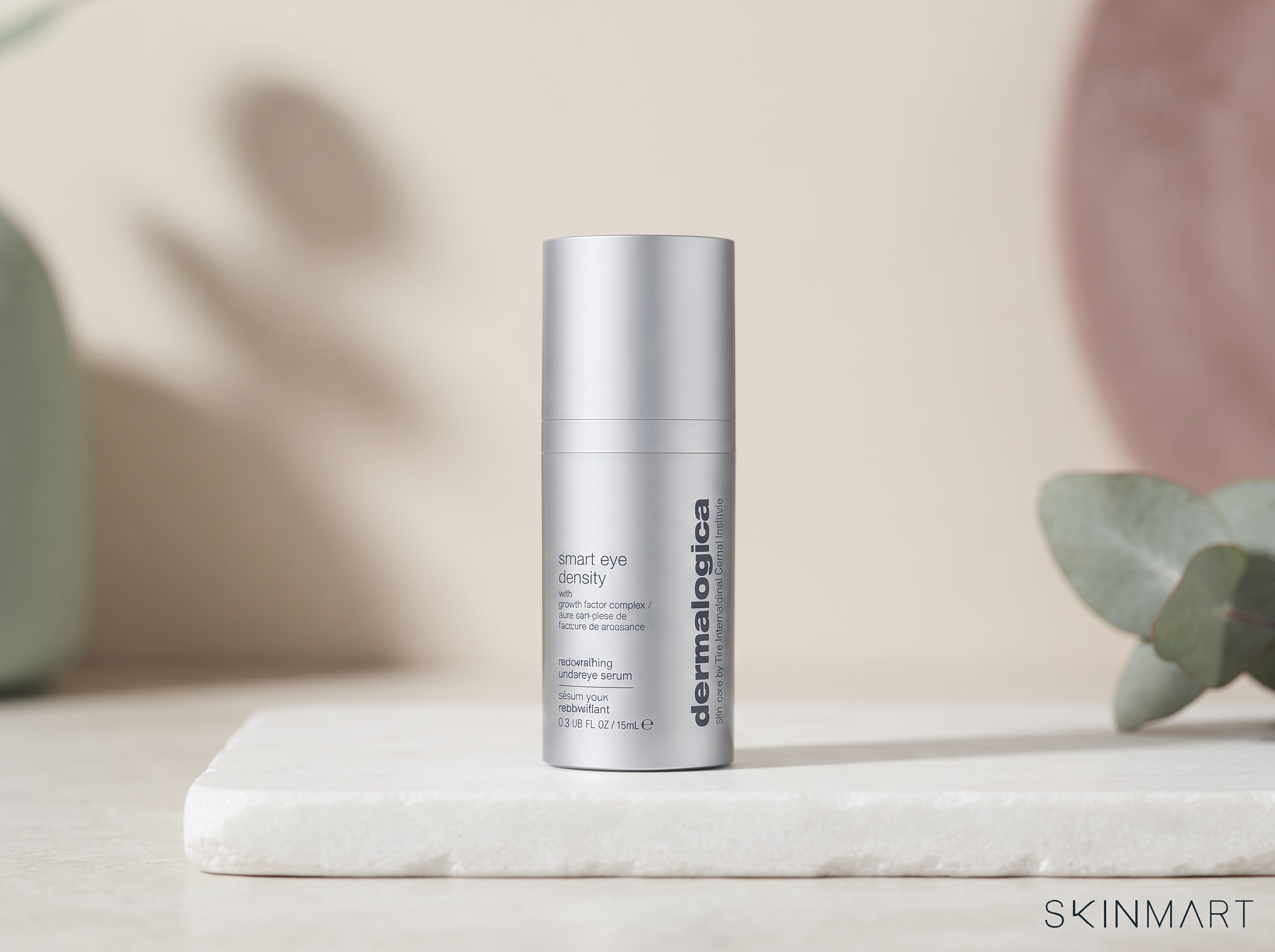 Full-size and 3ml trial size of an eye density serum placed side by side on a clean surface